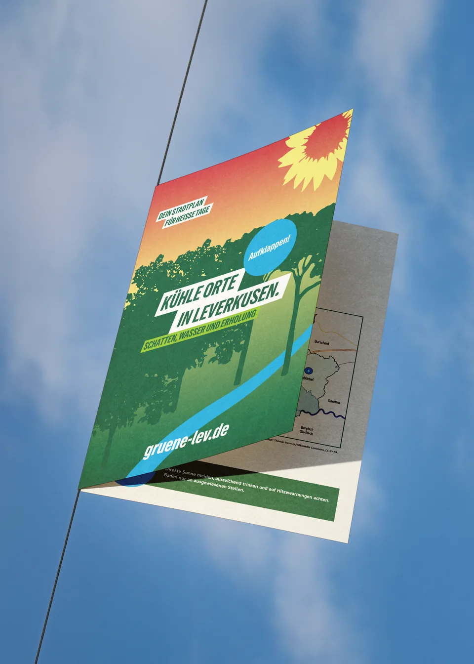 Stadtplan-Flyer vor Himmel